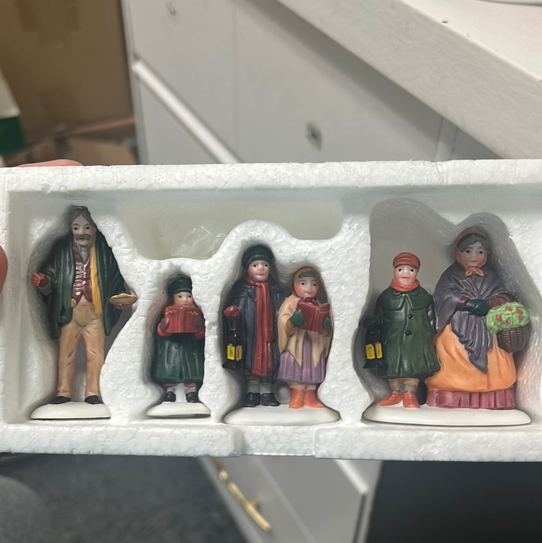 Carolers On The Doorstep