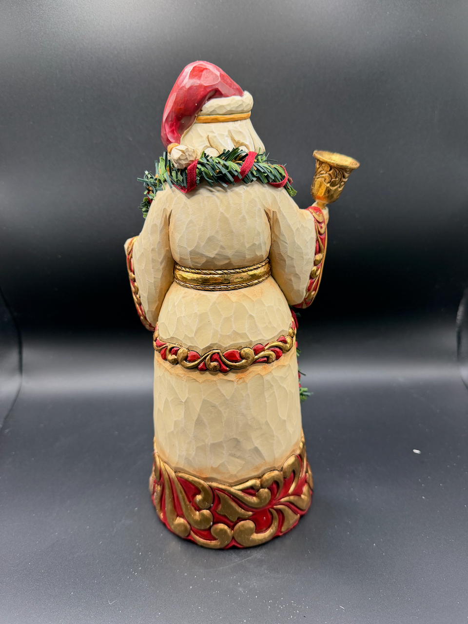 Ringing In The Season. Ivory And Gold Santa With Bell