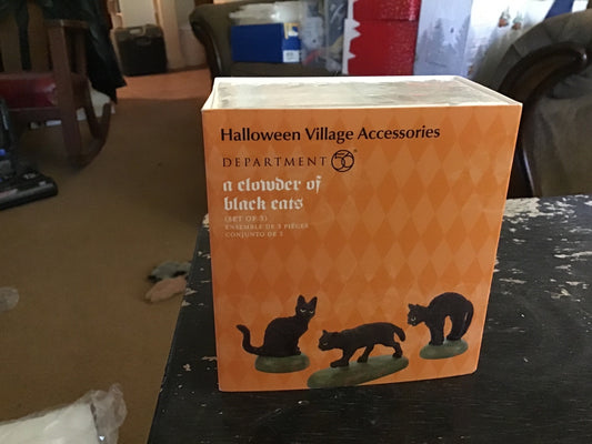 A Clowder Of Black Cats