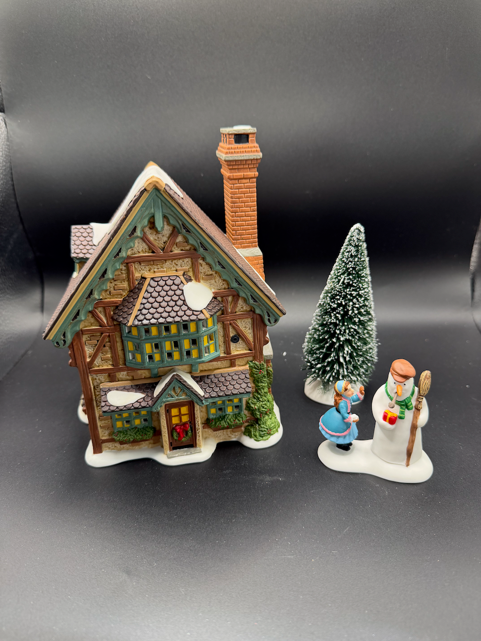 Building Christmas Cheer, Dickens' Village