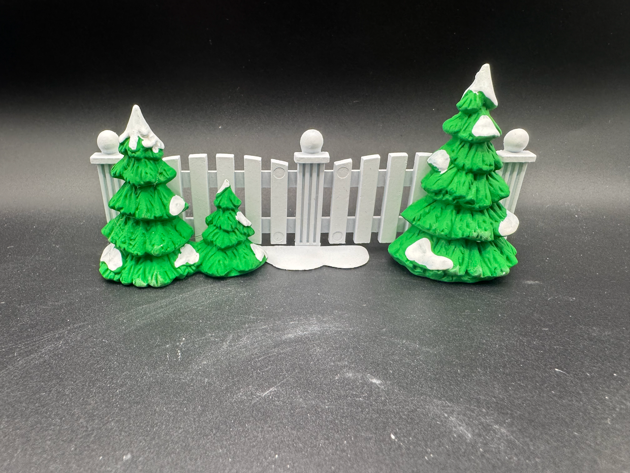 Frosty Tree-Lined Picket Fence